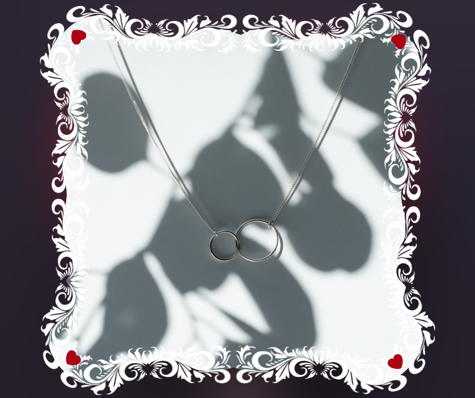 Image for the short story "Her Gift," featuring an infinity symbol necklace in a fancy white border.